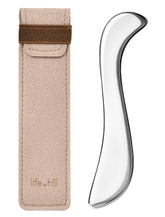 Lifechill stainless steel gua sha tool for full-body massage and smooth glide.