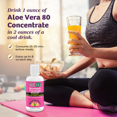 Glass with Lily of the Desert Stomach Formula mixed for a ready-to-drink option.