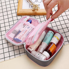 Linsiter empty travel medicine bag showing double zipper design for easy opening.