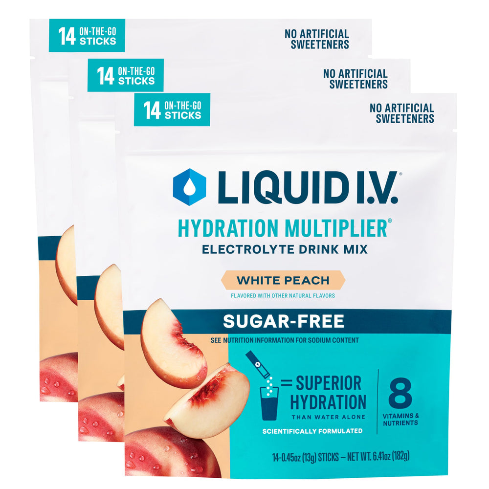 Liquid I.V. White Peach hydration packet dissolving in water for on-the-go hydration