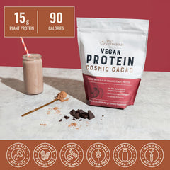 Live Conscious Cosmic Cacao serving scoop shows precise protein measurement.