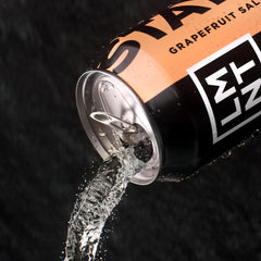 LMNT Sparkling Grapefruit Glass filled with fizz for daily hydration.
