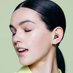 Loop Quiet 2 earplugs worn to reduce ambient noise at night.
