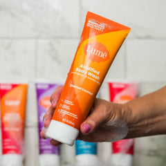 Lume Acidified Body Wash label close-up shows pH optimized and SLS-free claim.