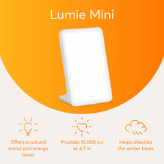 Lumie Mini Lamp angled on a bedside table for desk or dorm use with bright light