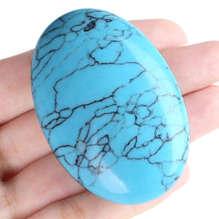 MAIBAOTA green turquoise palm stone in hand for grounding during focus sessions