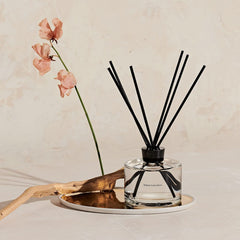 Maison Louis Marie No.04 diffuser reeds releasing fragrant aroma across room