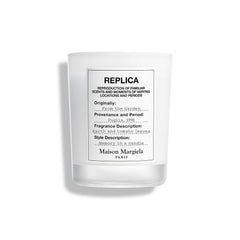 Maison Margiela Replica Garden Candle tomato leaf detail for inviting living room ambiance.