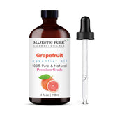 Majestic Pure grapefruit oil in amber bottle for premium diffusion.