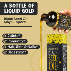 Label detail on MAJU Black Seed Oil bottle, cold-pressed Turkish origin.