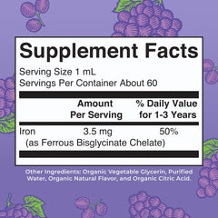 Close-up of grape-flavored iron liquid drops ready to measure for toddlers.