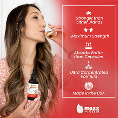 Maxx Herb Ashwagandha Extract dropper releasing droplets for fast absorption