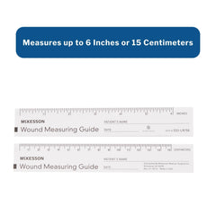 Closeup of graduated metric and imperial marks on McKesson ruler
