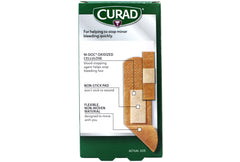 Medline Curad QuickStop Band A pad area showing oxidized cellulose, a natural clotting agent.