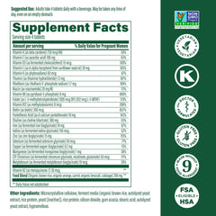 Pouring bottle of MegaFood Baby & Me 2 prenatal minis for on-the-go routines.