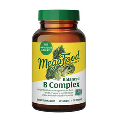 MegaFood Balanced B Complex bottle pour showing vegan, gluten-free formula for daily energy support