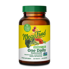 MegaFood Women 55+ multivitamin bottle on a kitchen counter for daily use.