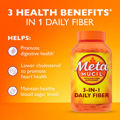 Metamucil capsules pouring into a cup.