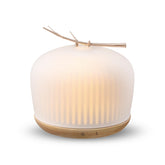 Mimicat quiet aromatherapy diffuser with glass-front design for tranquil rooms.