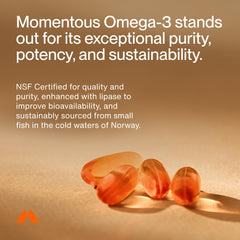 Close-up of Momentous Omega-3 softgels showing clear capsules and neutral profile.
