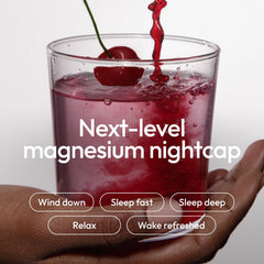 Moon Juice Sleepy Magnesi-Om powder dissolving in water for restful nights.