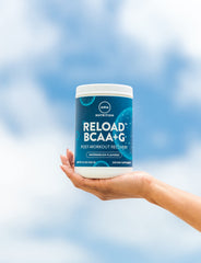 MRM Reload scoop with powder ready for hydration after workouts.