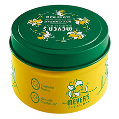 Close-up of Honeysuckle tin candle by Mrs. Meyer’s with scent notes