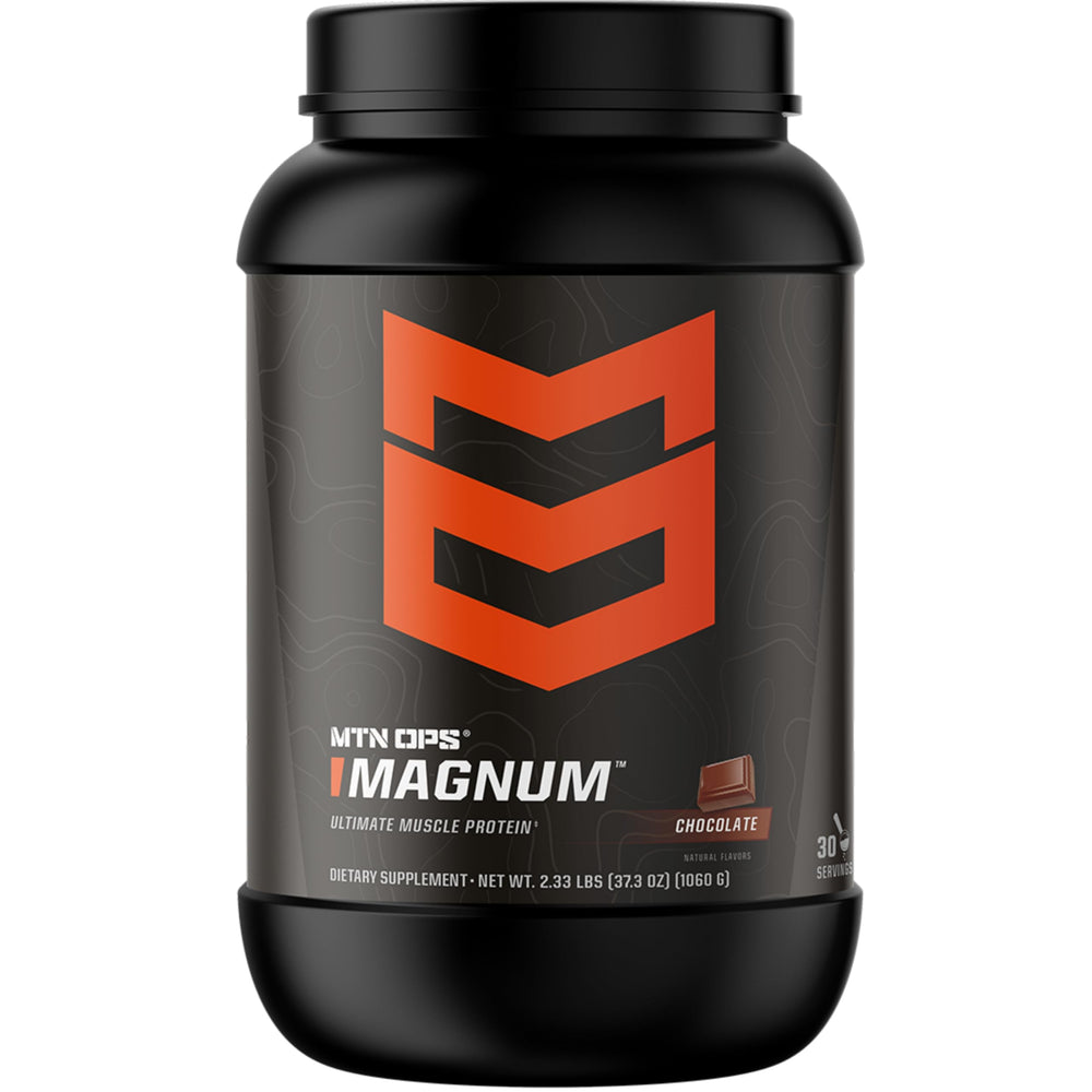 MTN OPS Magnum chocolate protein powder tub showing 23g protein per serving.