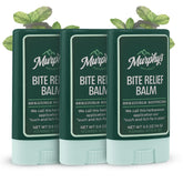 Murphy’s Naturals bite-relief balm stick in hand for quick, plant-based bite relief.