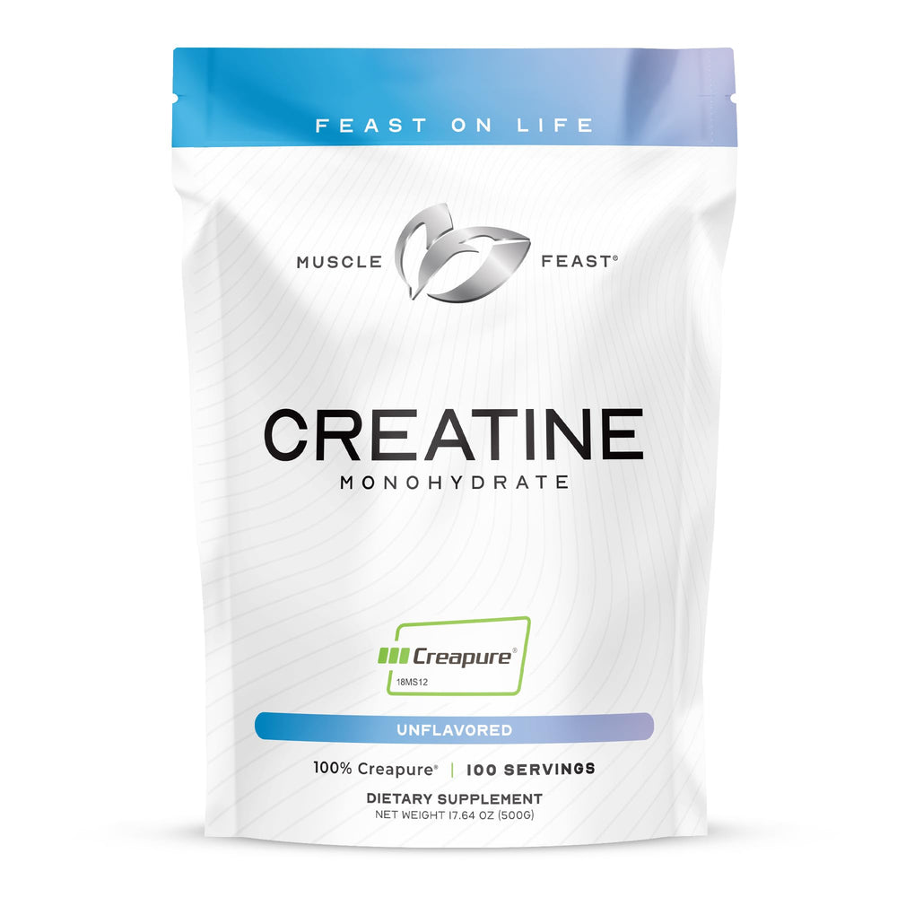 Muscle Feast Creapure creatine powder tub for steady energy during training.
