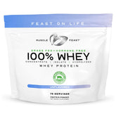 Muscle Feast grass-fed whey bottle showing premium protein from pasture-raised cows for everyday fueling.