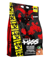 Mutant Mass weight gainer bottle pouring for bulk-friendly shake