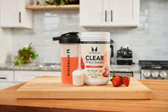 Myprotein Clear Whey Isolate Powder scoop captures convenient protein delivery for workouts