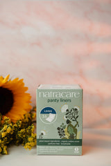 Natracare panty liners long highlight plastic-free, chlorine-free design for skin-friendly protection.