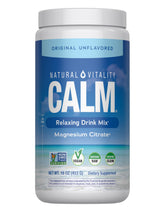 Natural Vitality CALM bottle with glass showing a refreshing stress-support drink.