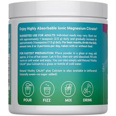 Natural Vitality CALM powder dissolving in water to create a fizzy raspberry lemon drink