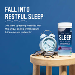 Blueberry pomegranate flavor of Natural Vitality SLEEP Gummies in a pile of gummies.