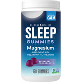 Natural Vitality SLEEP Gummies bottle on a nightstand, highlighting the product packaging.