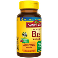 Nature Made B-12 lozenge texture close-up, smooth melt for easy consumption