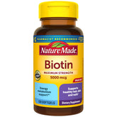 Nature Made Biotin 5000 mcg softgels bottle front promotes hair, skin, and nail health.