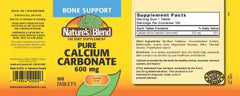 Nature's Blend calcium carbonate tablet close-up highlighting tablet shape and dosage.