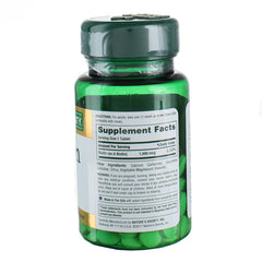 Close-up of Nature's Bounty Biotin 1000 mcg tablet, easy-to-take daily supplement.