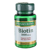 Nature's Bounty Biotin 1000 mcg bottle with strawberry flavor for daily use