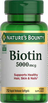 Nature's Bounty Biotin softgels bottle pour supports daily energy metabolism