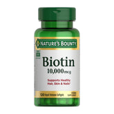 Nature's Bounty Biotin softgels bottle close-up highlighting 10,000 mcg for hair support.