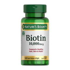 Nature's Bounty Biotin softgels bottle close-up highlighting 10,000 mcg for hair support.