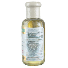 Dropper dispensing vitamin E oil for oral or topical use.