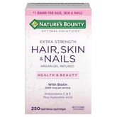 Nature's Bounty Hair Skin Nails tablets on bottle, designed to support healthy nails and vibrant skin.