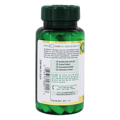 A person taking Nature's Bounty L-Lysine 1000mg for a simple daily ritual.