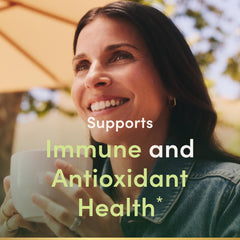 Nature's Bounty Vitamin E softgels bottle pouring easy daily use and convenience.